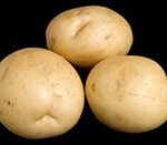 three attractively shaped potatoes 