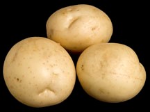 three attractively shaped potatoes 